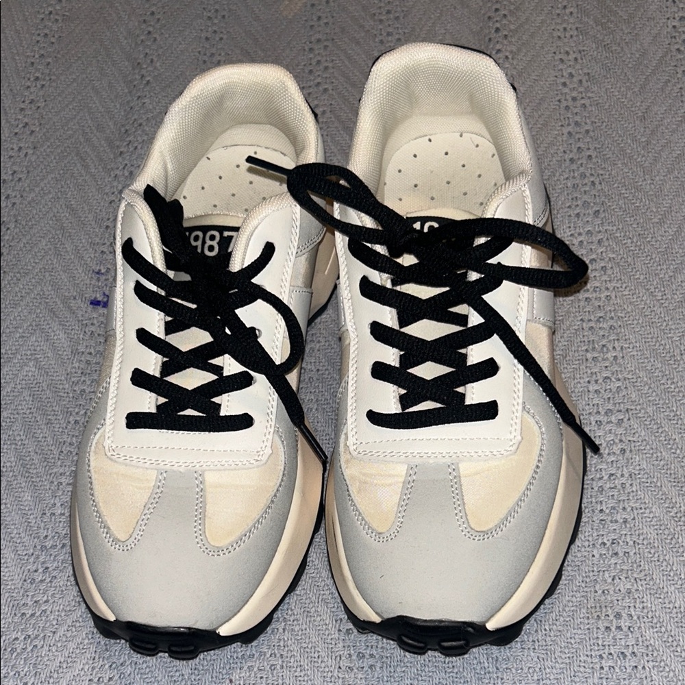 Stylish White and Black Sneakers